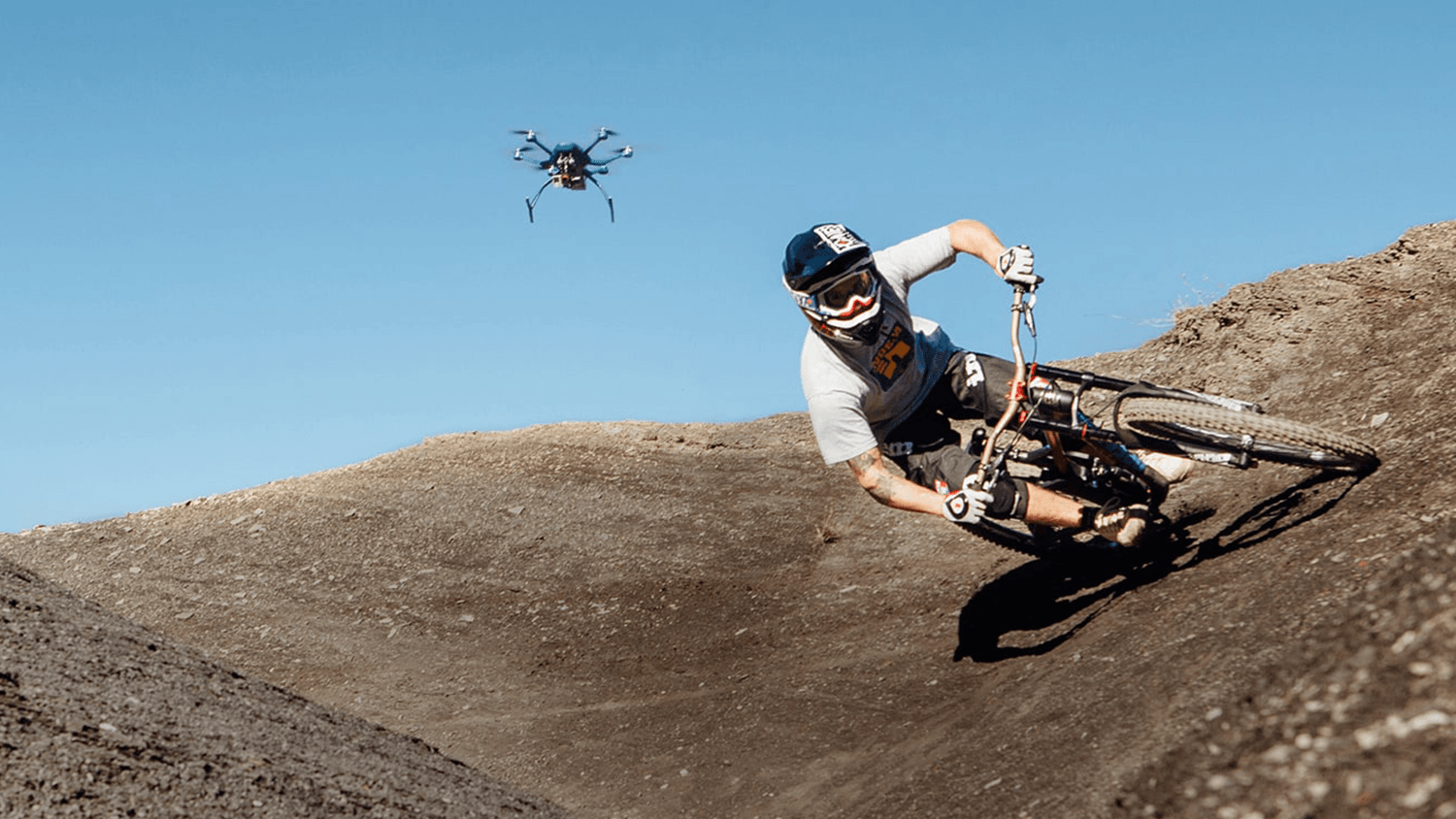 drone flying over bike race