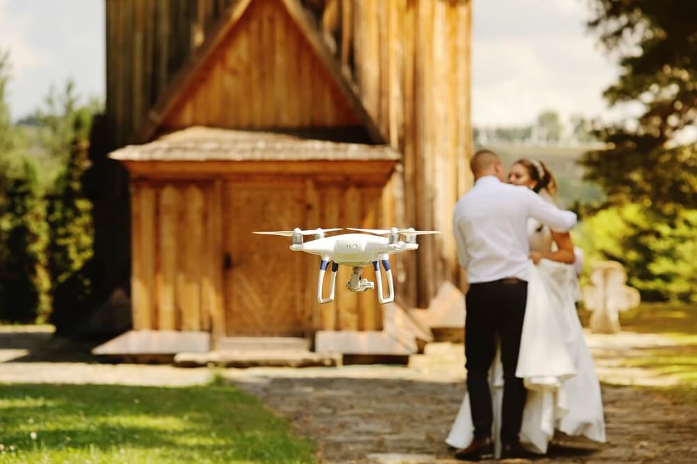 drone flying at wedding
